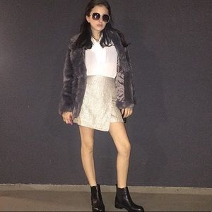 Super cute and flattering,faux fur jacket.